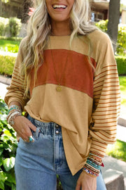 Maternity shirt with bishop sleeves, crew neck, and colorblock design in tan and rust.