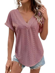 Pink purple eyelet v-neck tunic top with short sleeves and a curved hem.