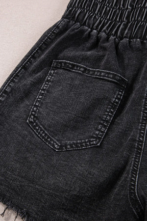 Black denim shorts with elastic waist and frayed hem detail