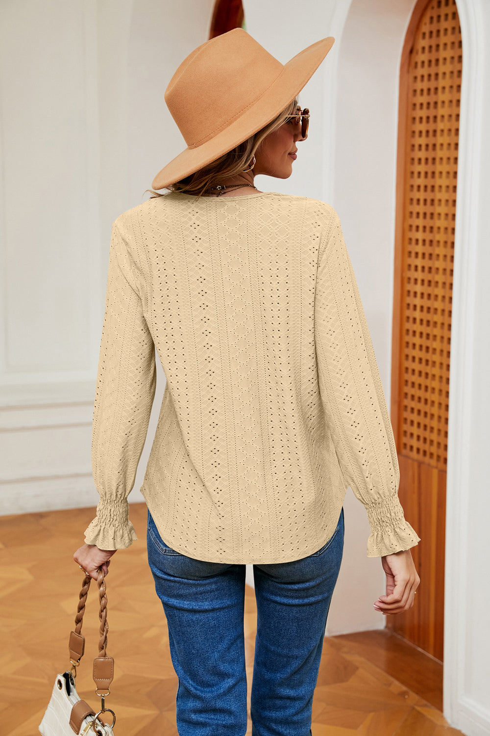 Pastel yellow eyelet blouse with lace trim and ruffle cuffs.