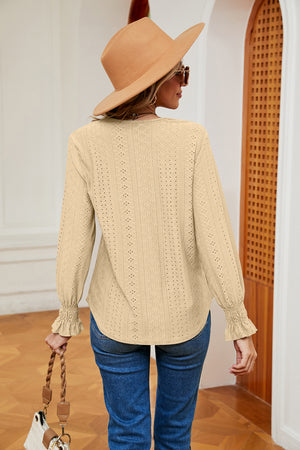 Pastel yellow eyelet blouse with lace trim and ruffle cuffs.