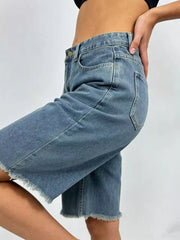 Blue denim bermuda shorts with frayed hem and belt loops