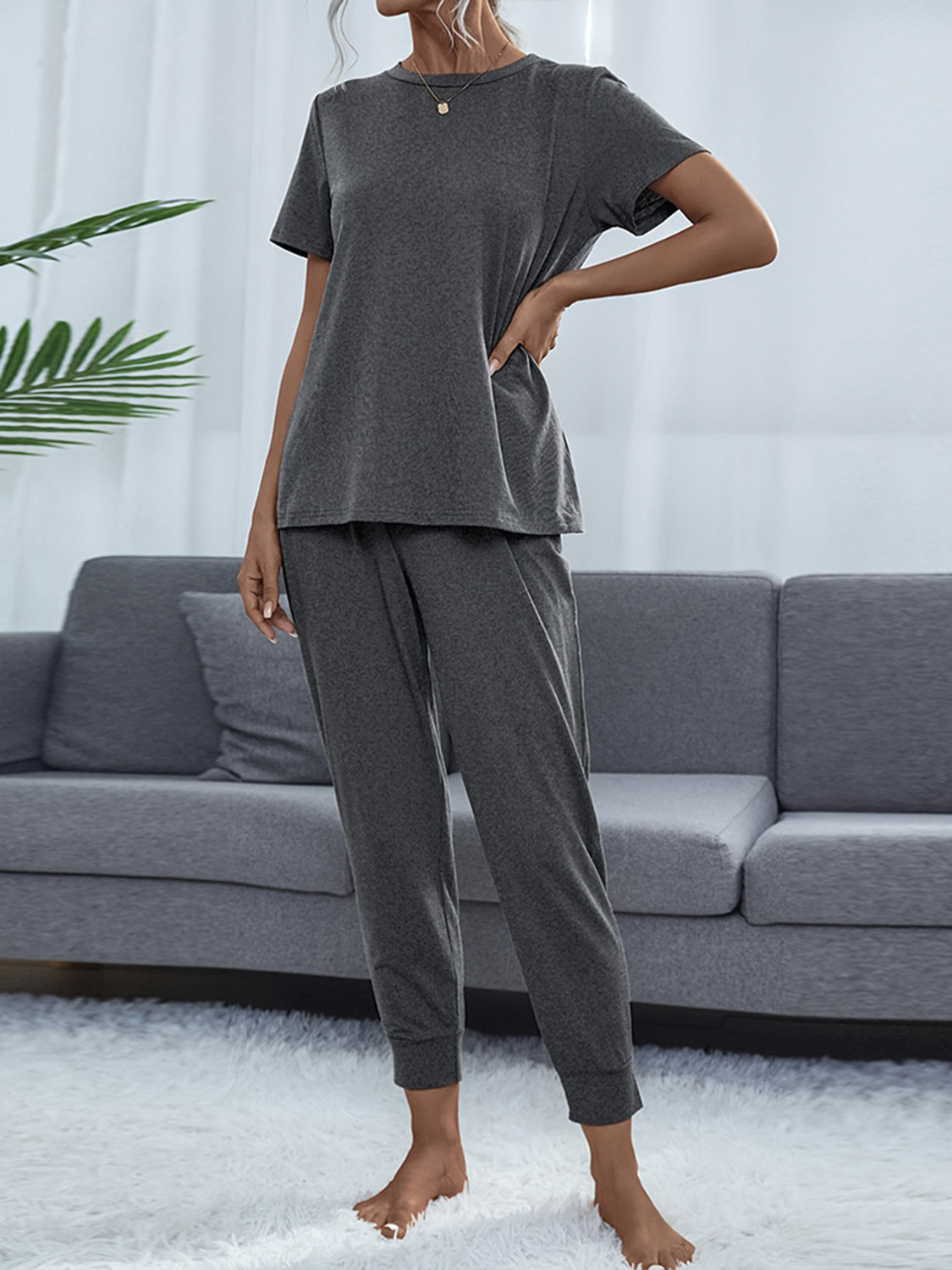 Charcoal relaxed-fit tee and jogger set with crew neck and cuffed ankles.