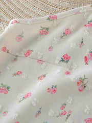 Floral cami and shorts set with delicate textured floral print and lace trim detail.