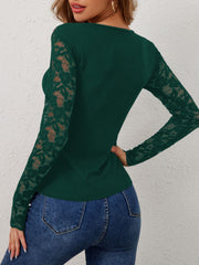 Dark green ribbed top with scalloped lace long sleeves and a crew neck.