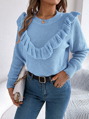 Light blue textured knit sweater with ruffle yoke detail and crew neck.