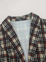 Tailored plaid vest with notch lapel and button detail