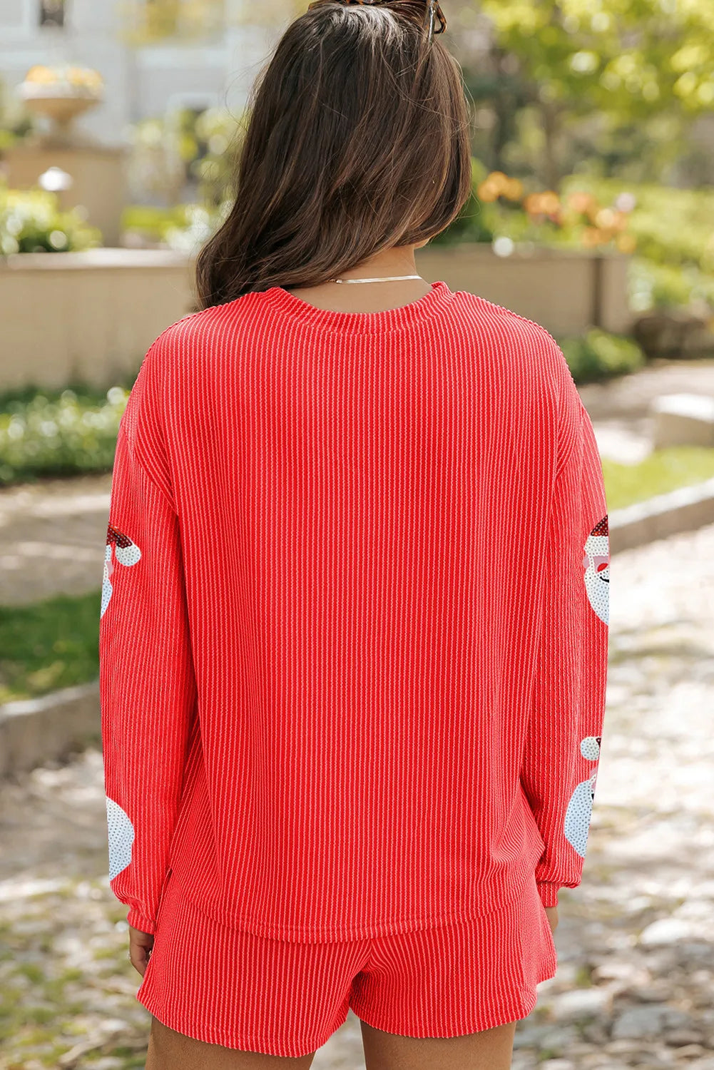 Red sequin Santa pleated co-ord set with ribbed texture and crew neck.