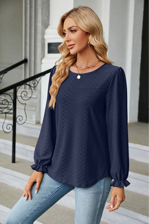 Dark Blue textured puff sleeve blouse with ruffle cuffs and crew neck.