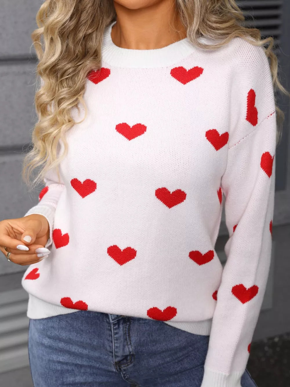 White knit sweater with red hearts, crew neck, long sleeves, casual style