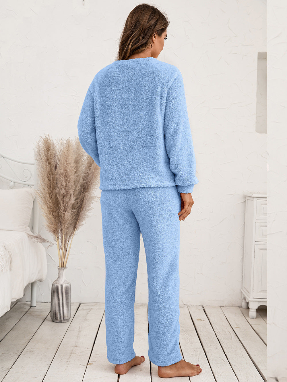 Plush raglan sleeve lounge set in light blue, featuring a crewneck sweatshirt and matching pants.