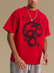 Red oversized t-shirt with black serpent graphic and text.