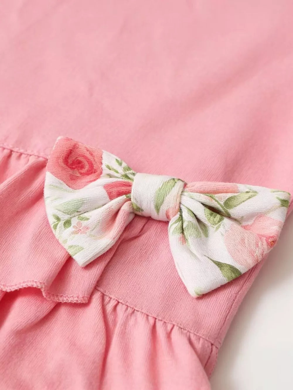 Pink ruffle top with floral bow detail, baby girl outfit