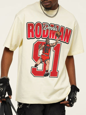 Vintage graphic t-shirt in pastel yellow with Dennis Rodman illustration and text.