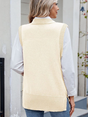 Cream ribbed knit vest with side buttons, worn over a white shirt.