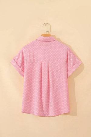 Pink polka dot casual button-up shirt with cuffed short sleeves and back pleats.