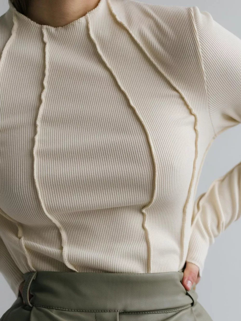 Apricot ribbed mock neck t-shirt with deconstructed seam details