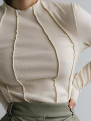 Apricot ribbed mock neck t-shirt with deconstructed seam details