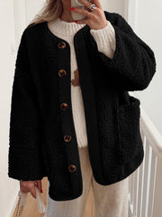 Black teddy-texture button-up jacket with corduroy trim and brown buttons.