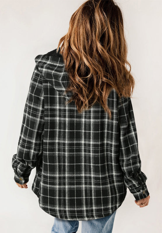 Sherpa-lined plaid overshirt jacket in black with button cuffs and a hood.
