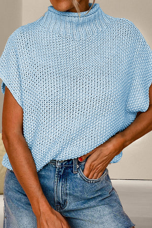 Light blue knit turtleneck shell sweater with short sleeves and a boxy fit.