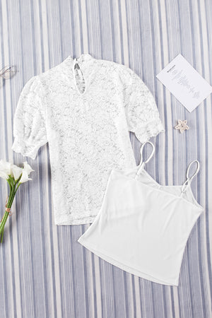 White lace puff sleeve mock neck blouse with keyhole detail and camisole.