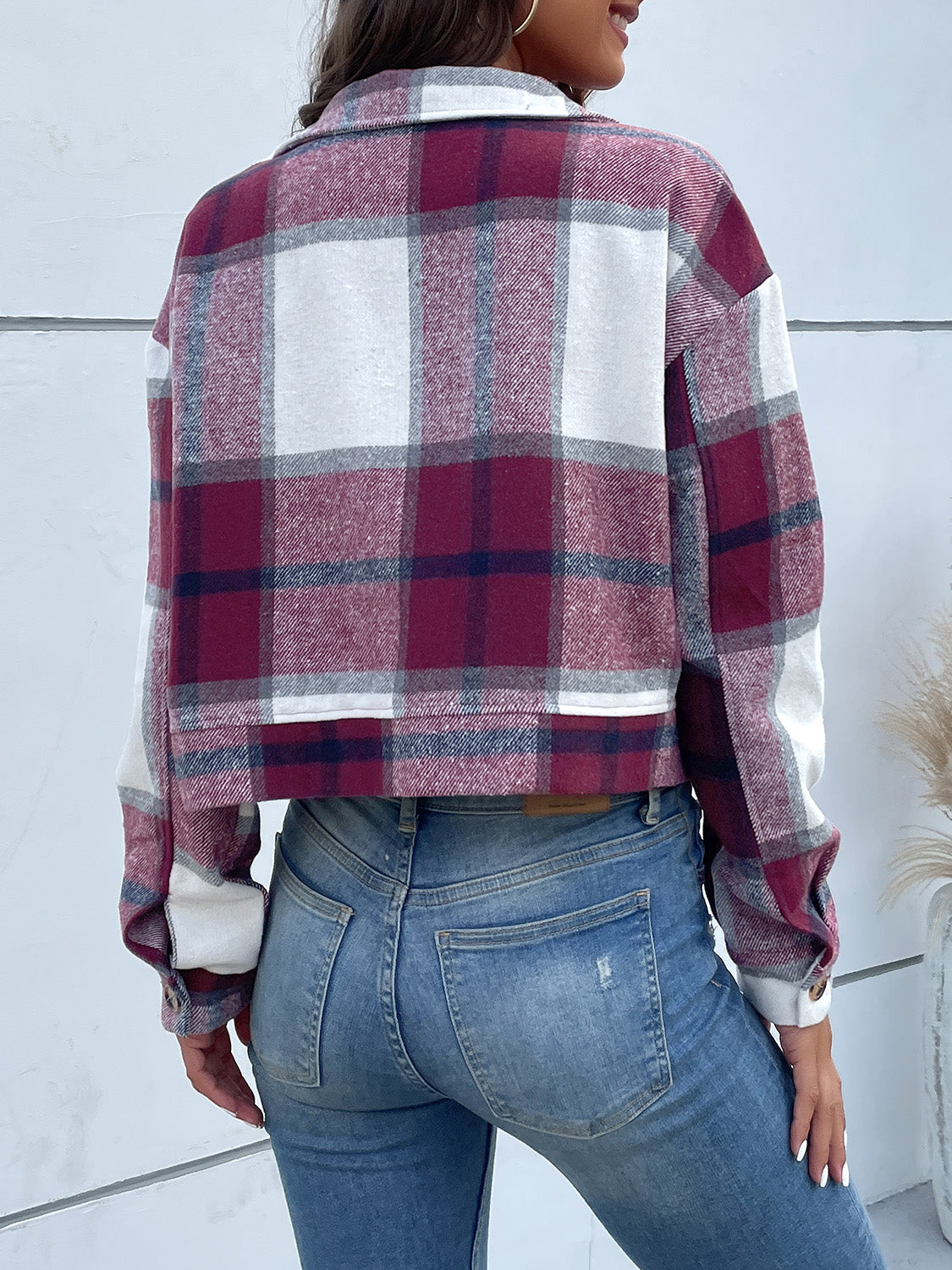 Checked plaid shacket in deep purple with patch pockets and button closure.
