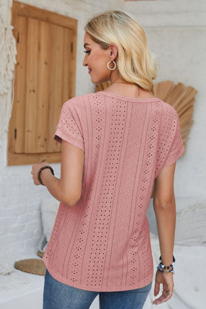 Perforated eyelet cuffed tee in blush pink with short sleeves and a relaxed fit.