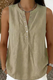 Taupe sleeveless maternity shirt with snap-down placket and band collar.
