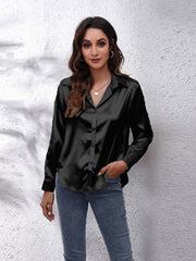Black satin collared button-down shirt with long sleeves.
