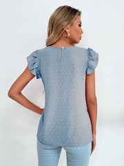 Light blue dotted swiss blouse with keyhole back and ruffle sleeves.