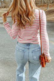 Ribbed turtleneck sweater in Stripe pink and white horizontal stripes, slim fit, long sleeves.