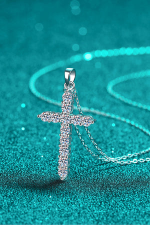 Silver pavé cross necklace with clear stones on a delicate chain.
