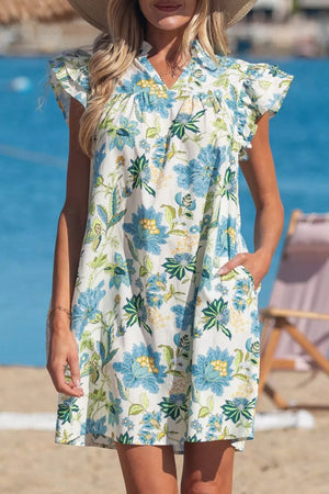 Floral V-neck mini dress with ruffled sleeves in cotton, featuring a blue and green floral print.