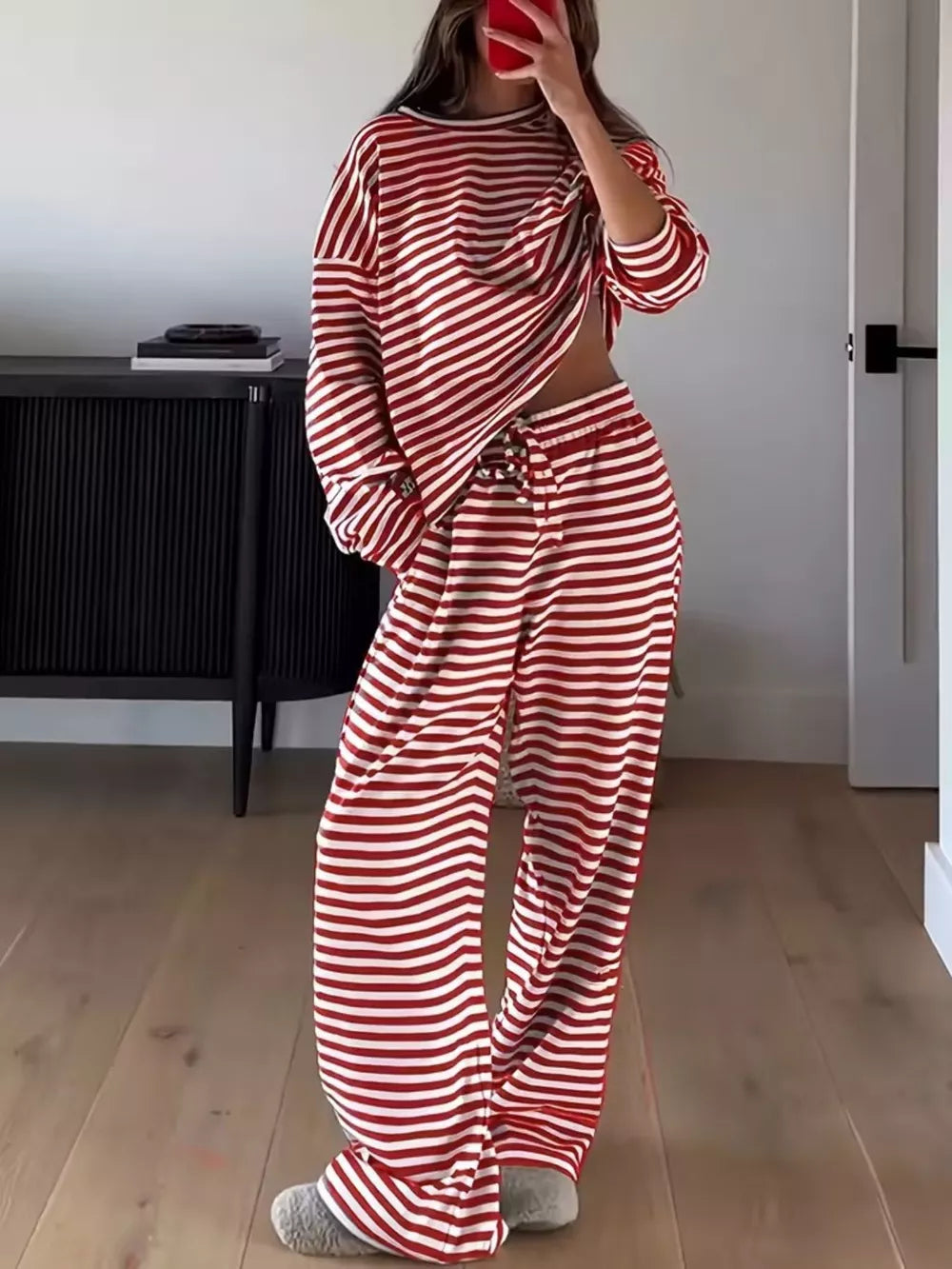 Chic striped two-piece lounge set in scarlet and white with drawstring pants.