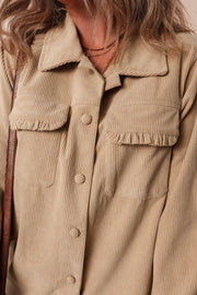 Tan corduroy utility shirt with ruffled chest pockets and button front.