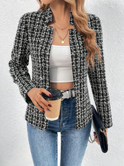 Black and white textured tweed open-front blazer with a plaid pattern.