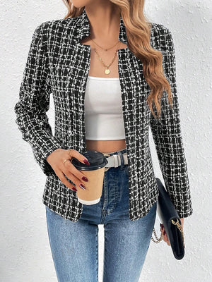 Black and white textured tweed open-front blazer with a plaid pattern.