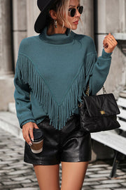 Deep Teal fringed chevron knit turtleneck sweater with a high neck.