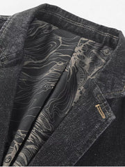 Men's black denim blazer with patterned lining and button detail