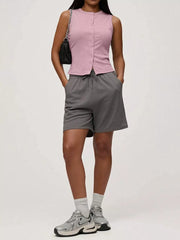 Pink ribbed button-front fitted tank top with a crew neck and sleeveless design.