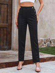 Black tailored trousers with elastic waist and button detail