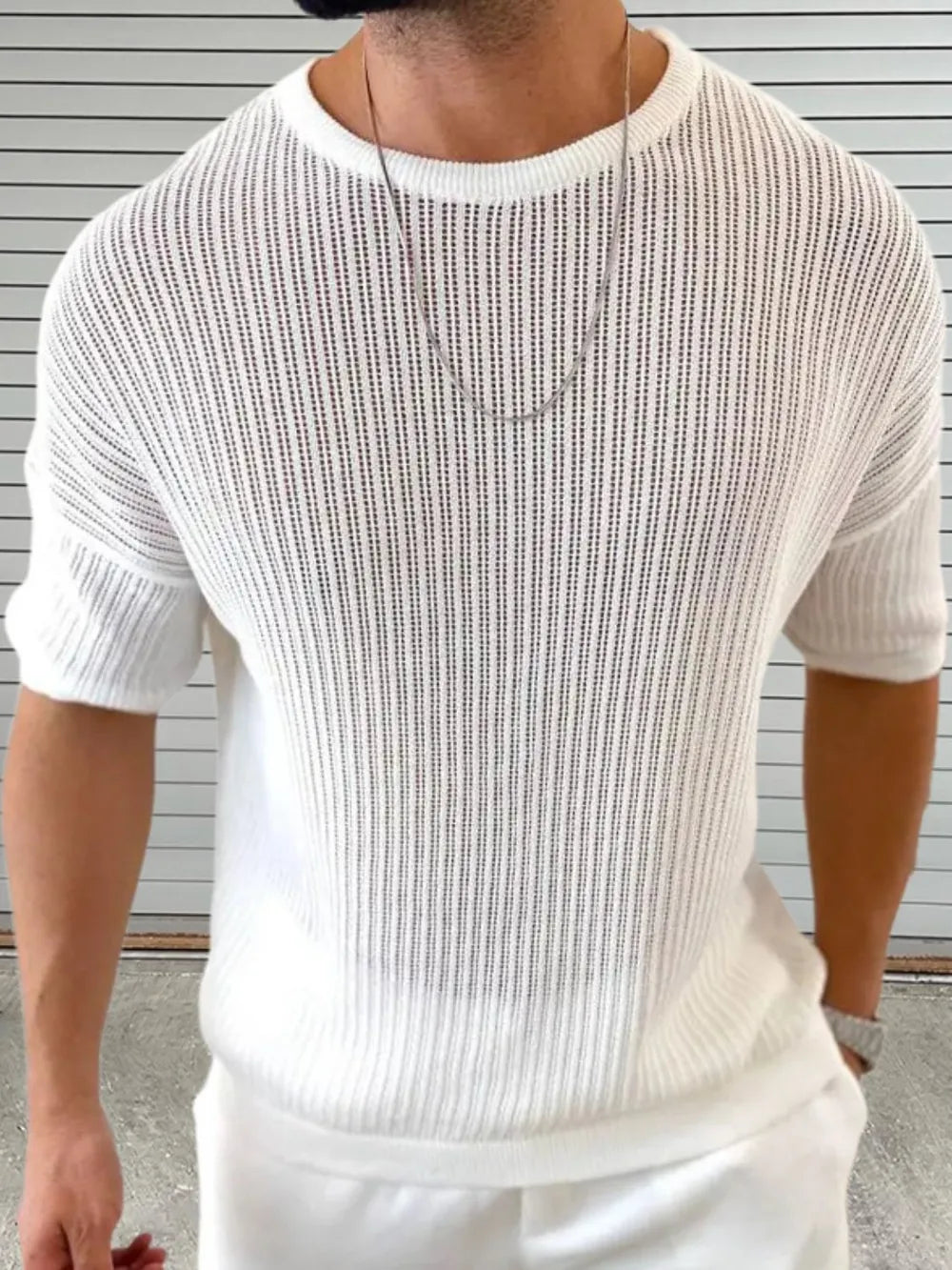 White open-knit boxy sleeve sweater with a crew neck and ribbed details.