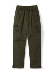 Relaxed fit green cargo pants with multiple zippered pockets and adjustable ankle cuffs.