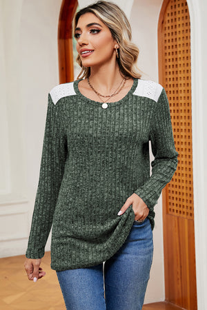 Matcha green ribbed knit top with eyelet shoulder detail and crew neck.