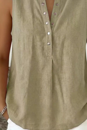 Sleeveless taupe maternity shirt with snap-down neckline and pleat detail.