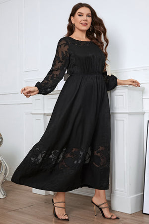 Black embroidered sleeve maxi dress with A-line cut and sheer floral details.
