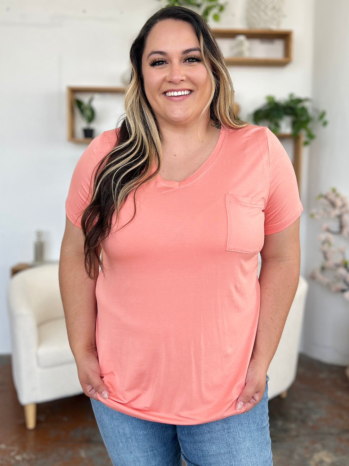 V-neck pocket tee in watermelon pink with short sleeves and a relaxed fit.