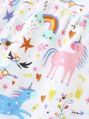 Toddler cotton dress with a white background and a colorful unicorn, rainbow, and star print.