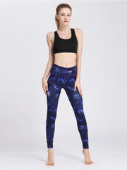 Cosmic print contour leggings in navy with piping detail.